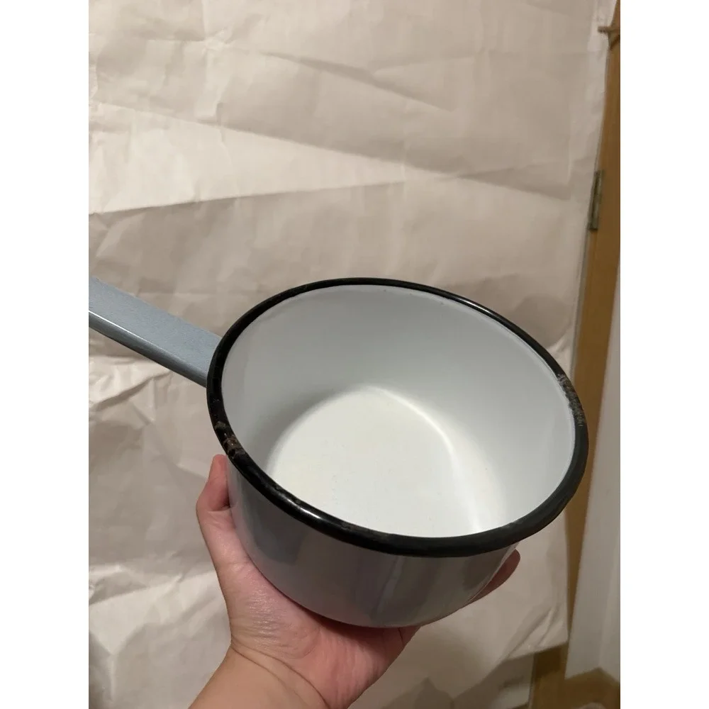 vintage light blue enamelware saucepan